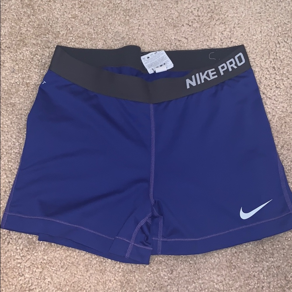 Purple/blue Nike spandex compression shorts
